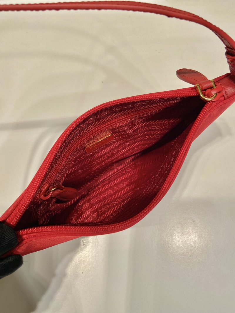 Pra*a clutch bags